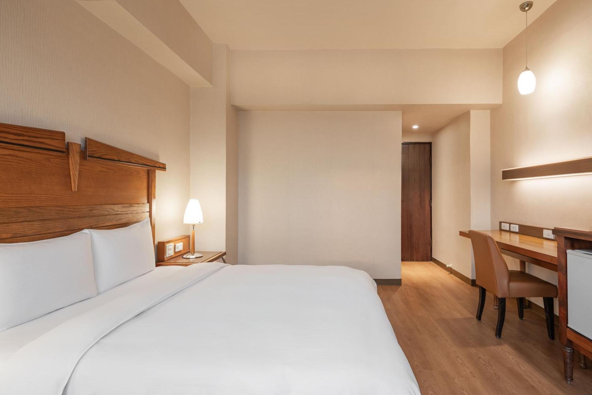 Kindness Hotel Wu-Jia Каосюн Стая снимка